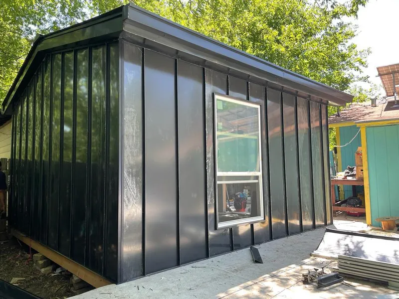 Black standing seam metal wall panels for Roof Inspection in Savage